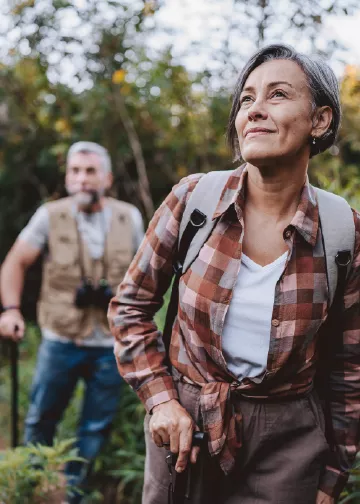  Two people hike together
