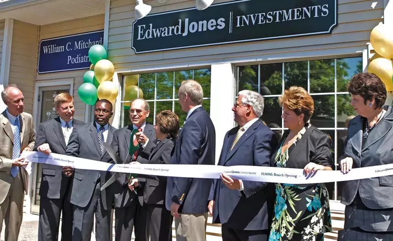  Photograph of John Bachmann opening the 10,000th branch office in 2008.
