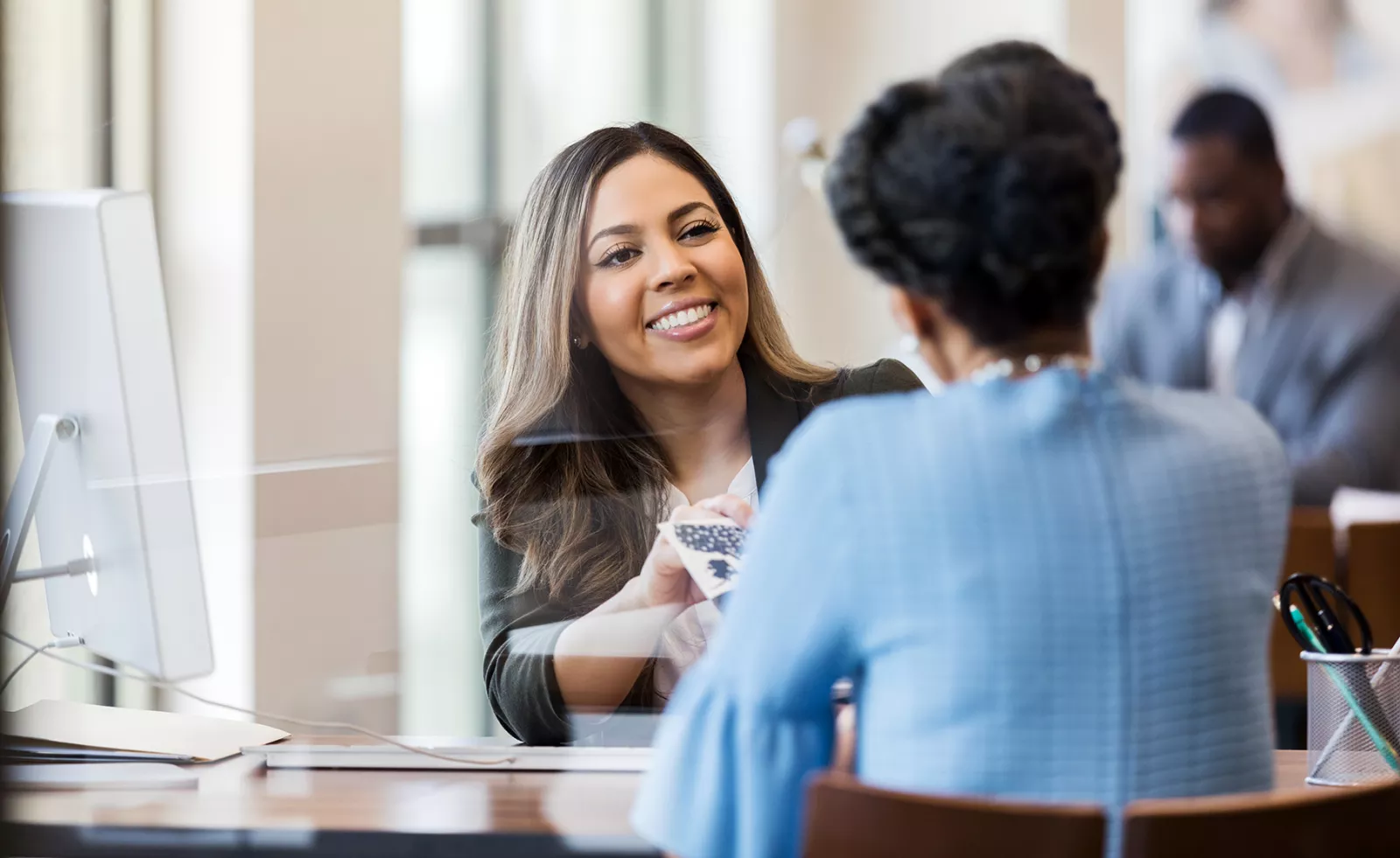  An Edward Jones financial advisor has an initial conversation with a client in an effort to understand her needs and values.
