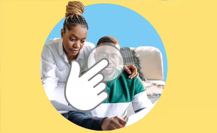 Two people reviewing paperwork.